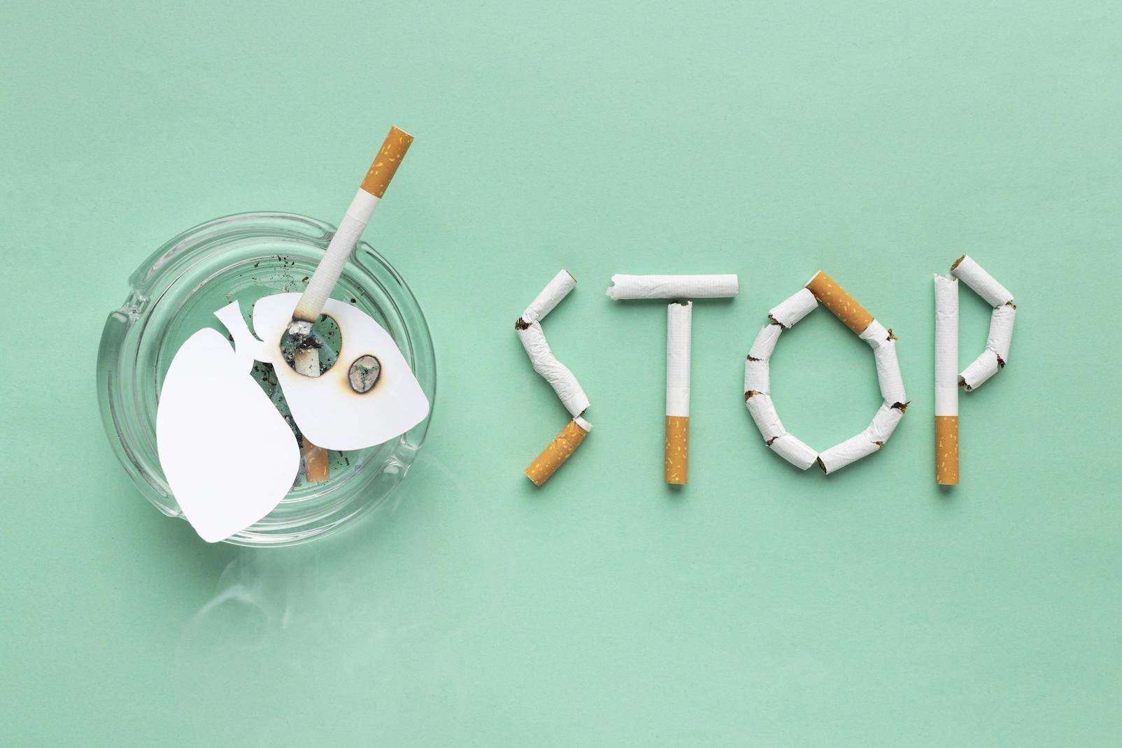 ilustrasi-asbak-dan-patahan-rokok-berbentuk-tulisan-stop